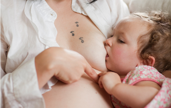 Pregnant Woman Breastfeeding 112