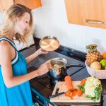 woman cooking soup
