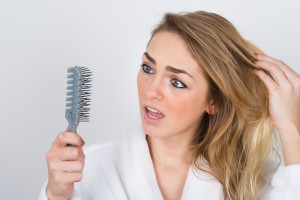 can taking estrogen cause hair loss